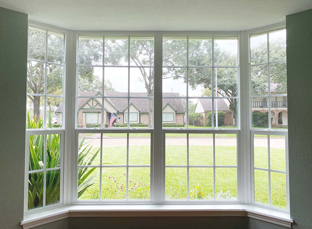 Vertical blinds in 2024 bay window